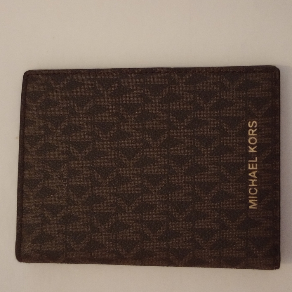 Nwot. Michael kors passport cover.